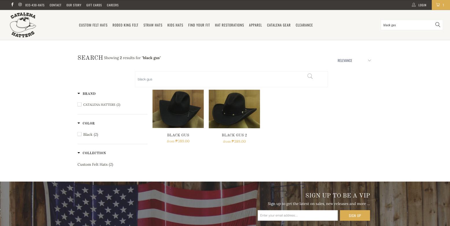 Search results page: the heading Search runs into Showing 2 results for black gus, a second full-width search box sits under the header search, and two black felt hats are priced from 389 pesos